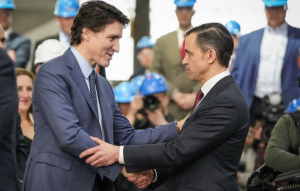 President of Davie, James Davies and Prime Minister Justin Trudeau shake hands.